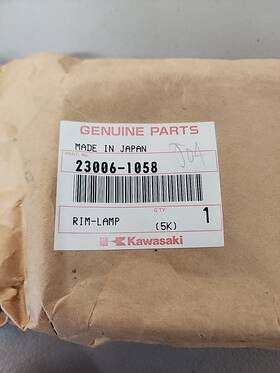 23006-1058 Kawasaki Headlight Head Light Lamp Trim Ring Rim New Oem