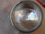 Suzuki Nos TS400 1973-1974 Headlight Seal Beam 35121-32610. Fixed Price $253.75.