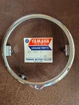 Yamaha Nos Headlight Rim, # L2-2102-C. Fixed Price $25.00.
