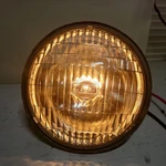 Nos Yamaha 1974-75 DT125 Koito Headlight 110-71761 444-84320-61 Tested. Fixed Price $30.00.