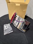 Drag Specialties Side Mount Half-moon Taillight And License Plate. Fixed Price $150.00.