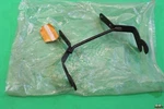 Nos Kawasaki 1986 KLF300 Headlight Bracket Stay 35011-1256. Fixed Price $14.95.