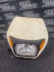 1989 Yamaha XT350 Headlight Shroud Cowl Cover For Parts- No Lense. Fixed Price $69.00.