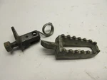 1973 Hodaka 250 Sl Thunderdog Foot Peg With Bracket And Spring 719114. Fixed Price $25.56.