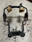 1986 Kawasaki KE100 Speedometer Headlight Support Bracket Mount. Fixed Price $35.00.