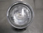 EB1038 2005 Yamaha Vstar 1100 Headlight. Fixed Price $99.99.