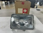 Honda Nos Elite CH125, 1984-86, Headlight Unit, # 33120-KJ9-670.. Fixed Price $75.00.