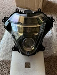 2021+ Suzuki Hayabusa Aftermarket Headlight 35100-10L00. Fixed Price $100.00.