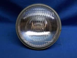 Kawasaki 23007-068. Oem Head Lamp. Koito 6V 35/35W. Fits KE175(76-78).. Fixed Price $149.95.