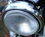 Yamaha XJ700 Maxim Headlight Assembly YHA-169 With Mounting Plate. Fixed Price $54.99.