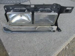 85-89 Volvo 740 Rh Headlamp W/grille Bracket. Fixed Price $225.00.