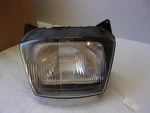 Oem Kawasaki Ninja ZX600 750R Headlight 23007-1155. Fixed Price $107.06.