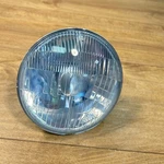 New Delta Harley Davidson H4 5.75" 60/55W Halogen Headlight. Fixed Price $30.00.