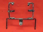 87 Honda Atc Headlight Mounting Bracket # 61310-HA6-680. Fixed Price $40.00.