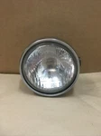 1997 Kawasaki Vulcan Oem Headlight Assembly 23007-1304. Fixed Price $87.50.
