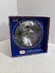 Candlepower 7 Motorcycle Headlight H4 Quartz Halogen 12V Nos. Fixed Price $29.00.