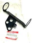 Nos Suzuki Headlight Mount Rh 51530-32E00. Fixed Price $26.40.
