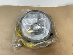 1972 Suzuki Ts 400 New Old Stock 12V Headlight 35121-18610. Fixed Price $275.00.
