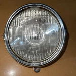 Honda Headlight Assy CL125 33100-243-670, 33100-243-671, 33100-243-672. Fixed Price $35.00.