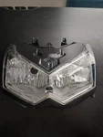 #125 2010 Kawasaki Z1000 Black Front Headlight (bulbs Not Included). Fixed Price $70.00.