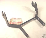 Kawasaki KLF300 Bayou 1986 Nos Head Lamp Stay. Fixed Price $33.00.