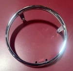 Triumph Headlight Bezel T2704014. Fixed Price $99.99.