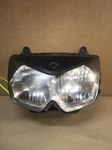 2003 Kawasaki Oem Headlight 23007-1442. Fixed Price $57.00.