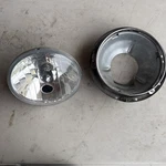 Oem Harley 67001-08 Head Light & Retaining Mount 97-13 Touring Ultra Fl. Fixed Price $37.00.