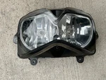 08-12 Kawasaki Ninja 250R Oem Front Lamp 23007-0121. Fixed Price $57.99.
