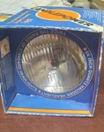 5-3/4" Quartz Halogen Headlight Bulb Harley Hon Suz Yam Candlepower H402212. Fixed Price $30.00.