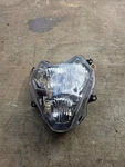 02-13 2012 Honda Fsc 600 Silver Wing Headlight Front Lamp Housing Lens. Fixed Price $99.95.