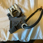 05-06, 2005-2006 Kawasaki Ninja ZX6R/636 Rear Back Brake Caliper Mount Bracket. Fixed Price $100.00.