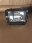 97 Kawasaki EX250 Headlamp Oem #23007-1194. Fixed Price $15.00.