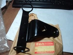 1977-79 Suzuki GS550E Bracket, Headlamp Lh P/n 51540-47001-291. Fixed Price $34.99.