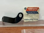 New Nos Factory Yamaha Headlight Stay 1978-1983 XS650 Part# 2M0-84318-00-00. Fixed Price $20.00.