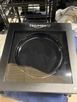 Triumph Genuine Headlight Bezel Machined A9838243. Fixed Price $137.00.
