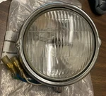 *headlight Assy. (6V35/36.5W) Stanley CT110 80-86 CT90 '79 33100-102-871 Nuoksf. Fixed Price $175.00.