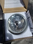 5.75" Harley-davidson Headlight. Fixed Price $40.00.