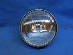 Kawasaki 23007-017. Oem Headlamp Lens. Fits G3SS.. Fixed Price $66.95.