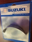 Nos Suzuki Chrome Headlamp Visor VL1500 Intruder 99950-70206. Fixed Price $19.00.