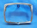 Yamaha 1UY-84315-00-00. Oem Headlight Rim. Fits "warrior" YFM350(87-92). B578.. Fixed Price $14.95.