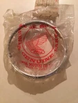 Nos Honda CB360 Headlight Rim 33101-369-670. Fixed Price $199.99.