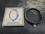 Harley Aermacchi Ducati Benelli CEV130 Nos Headlight Rim Ring Mod 6111 2463. Fixed Price $67.50.
