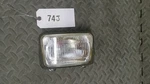 06 Suzuki Headlight 35100-12ED0-999. Fixed Price $115.00.