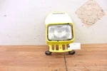 2007 Suzuki DR200SE Headlightassembly W/ Shroud And Mounts. Fixed Price $119.00.