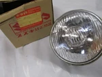Suzuki Headlight Bulb Assembly 1972 RV90 Rover 35121-27690 Nos. Fixed Price $149.00.