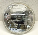 Wagner 6015 Sealed Beam Headlight Bulb 12 Volt 7". Fixed Price $10.00.