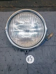 1976-78 Honda Headlight Assembly Bench Tested #33100-391-670. Fixed Price $150.00.