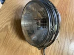 Harley Davidson Headlight Assembly Probably Dyna Glide. Fixed Price $99.00.