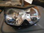 Nos Kawasaki 2008-2012 EX250 Ninja 250R Oem Headlight Lamp Assy 23007-0121. Fixed Price $249.99.